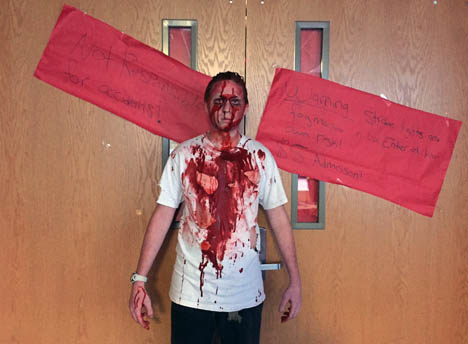 Caption for photo: Junior, Tommy Devore, get’s ready for haunted high. 