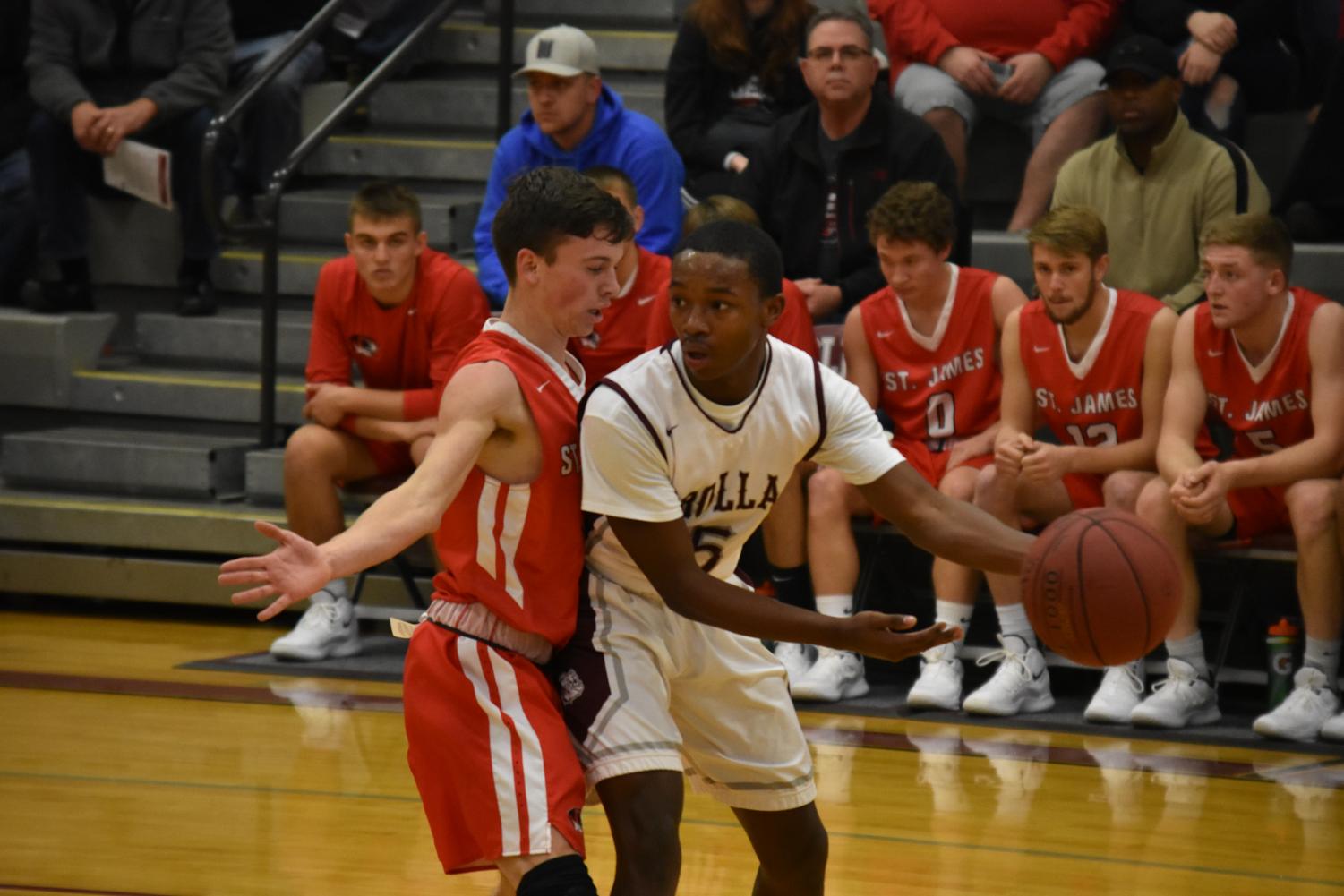 Photo gallery: boys basketball wins over St. James