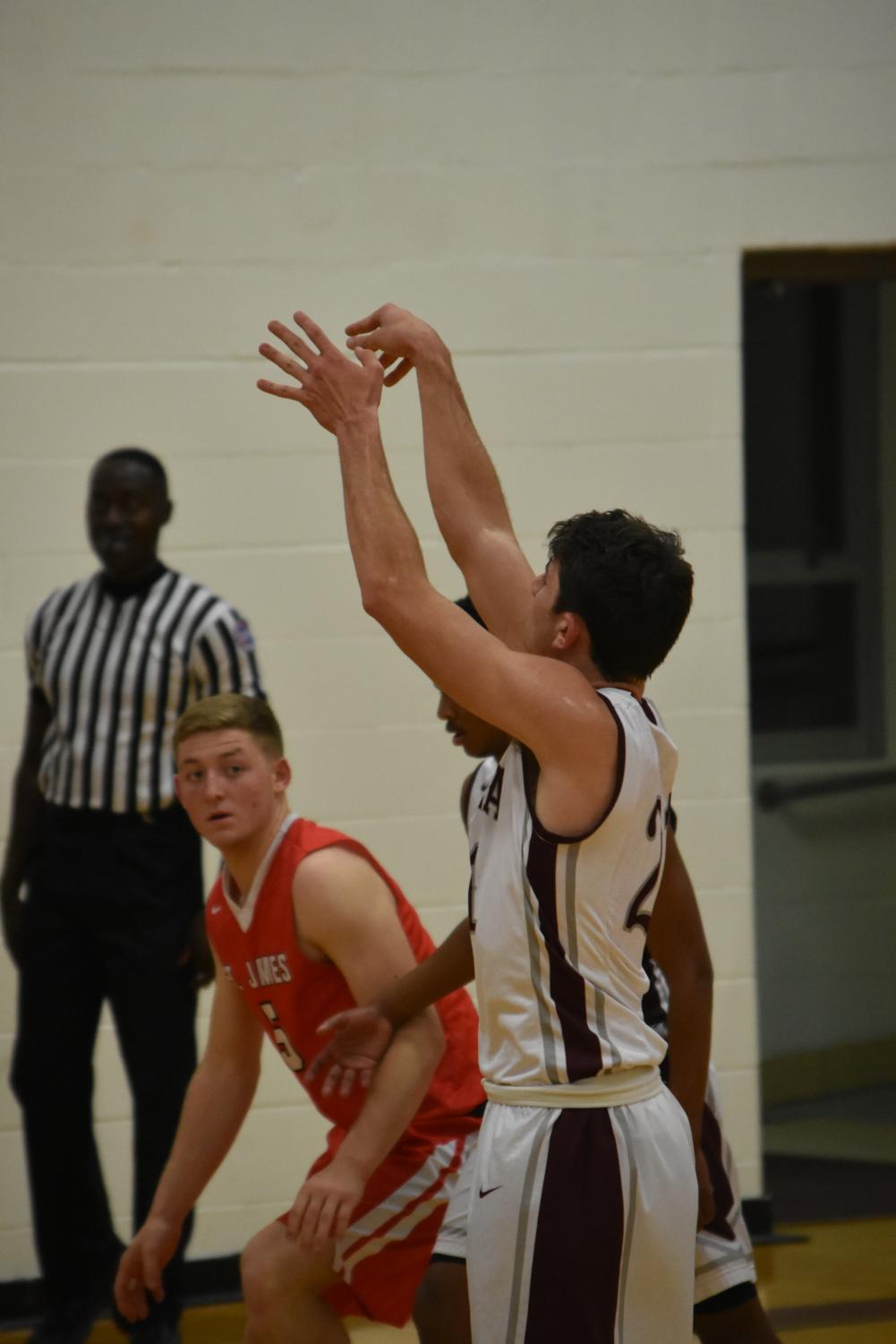 Photo gallery: boys basketball wins over St. James