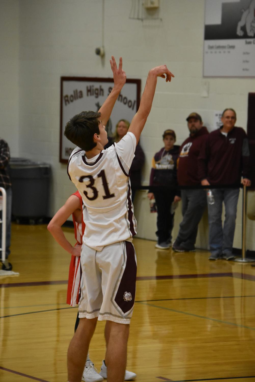 Photo gallery: boys basketball wins over St. James