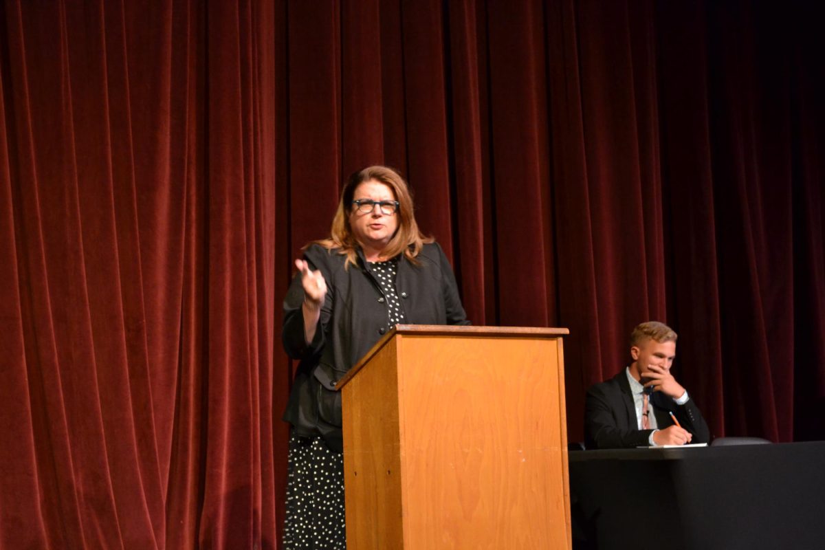 Sophomore Beau Heese and local attorney Carolyn Buschjost debate at the first annual Speech and Debate Showcase.