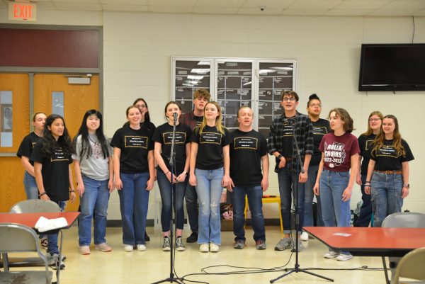 Choir members perform at benefit dinner and auction for Mr. Bartelsmeyer