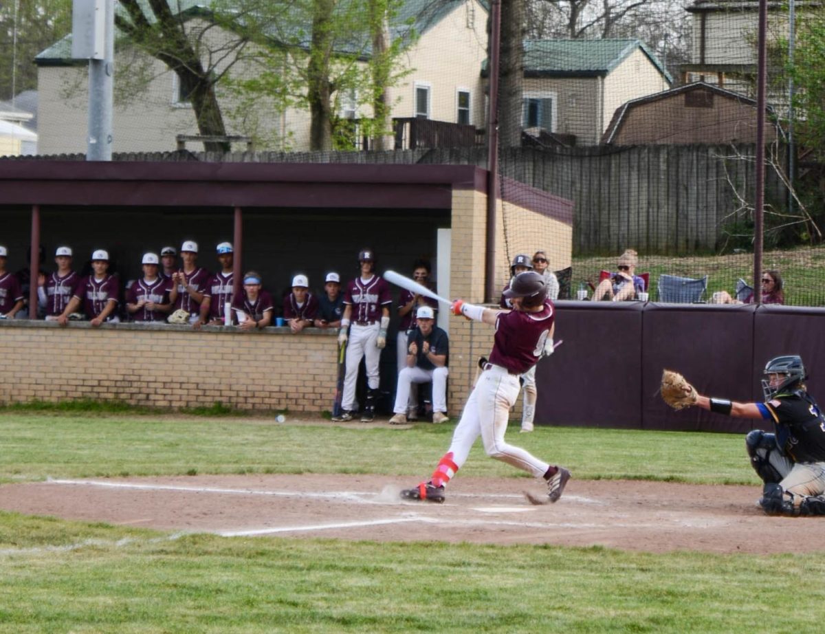 Varsity graduates step back on the diamond for District play