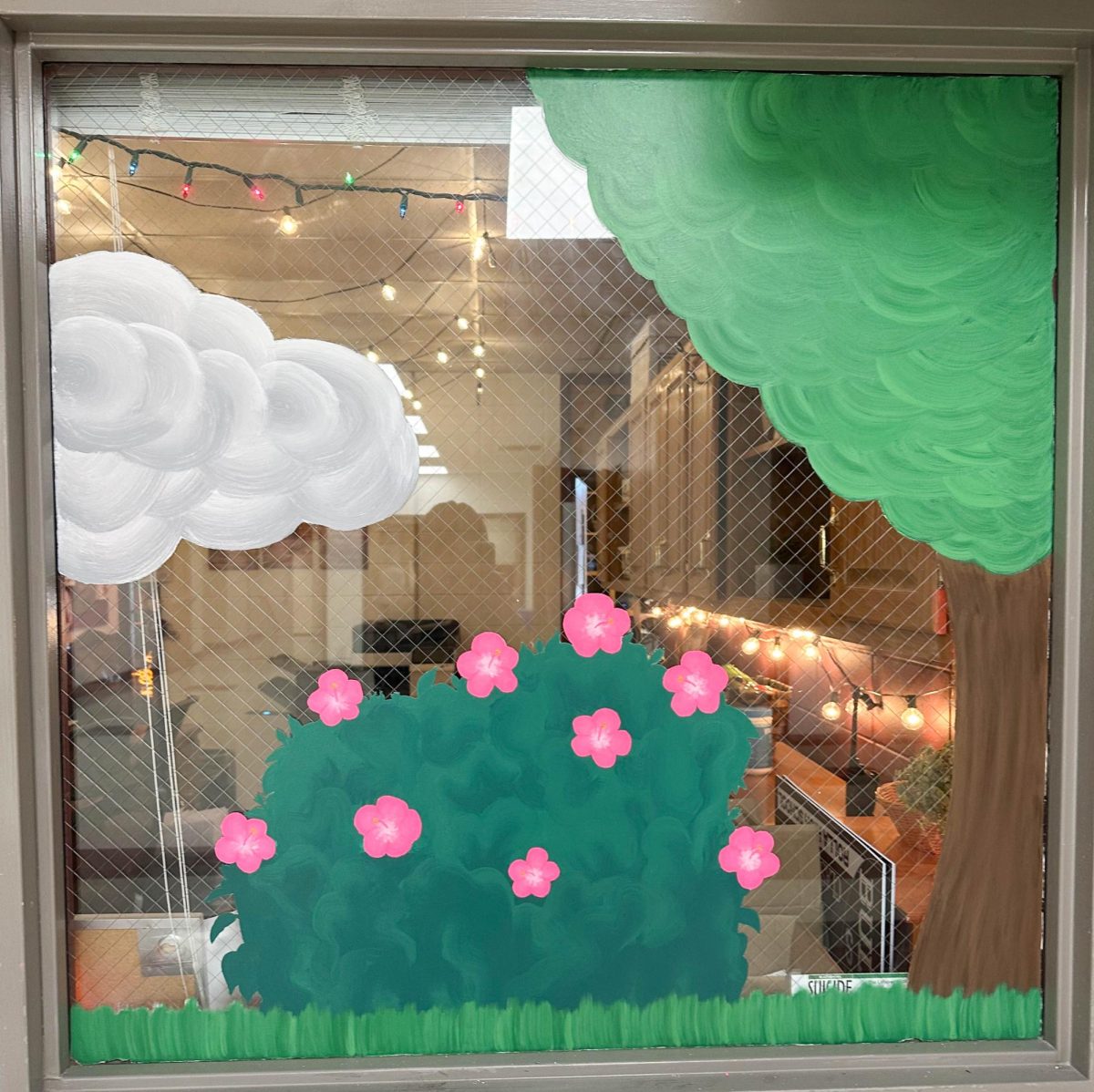 Students paint seasonal mural: the faces behind the art